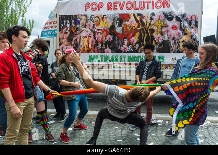 Paris, France, French Group of Diverse Teenagers, Playing at Gay Pride, LGBT Activism, on Street,  activism art, france multicultural, Queer activism Stock Photo