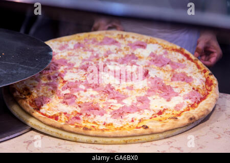 Picture taken in Venice, Italy. Showing a fresh hot venetian pizza just out of the owen Stock Photo