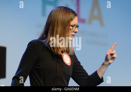 Housing advocate Sara Maxana, of Seattle,  speaks during the YiMBY Conference in Boulder, CO. Stock Photo