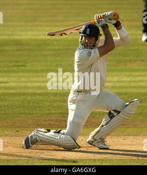 England's Kevin Pietersen hits four runs late in the day Stock Photo