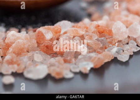 Himalayan pink rock salt crystals extreme closeup Stock Photo