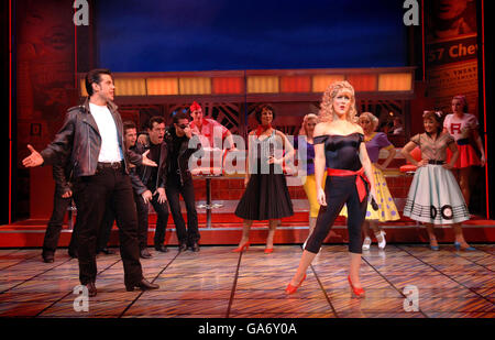 Danny Zuko and Sandy perform a scene - played respectively by Danny Bayne and Susan McFadden - from the musical Grease, which will play at the Piccadilly Theatre in central London from 08 August 2007. Stock Photo
