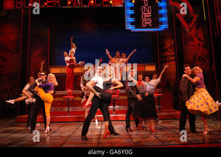 Danny Zuko and Sandy (centre) perform a scene - played respectively by Danny Bayne and Susan McFadden - from the musical Grease, which will play at the Piccadilly Theatre in central London from 08 August 2007. Stock Photo