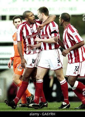 Soccer - Nationwide League Division Two - Stoke City v Blackpool. Stoke City's Siarhei Shtaniuk is congratulated by team mate Chris Iwelumo after scoring the first goal against Blackpool Stock Photo