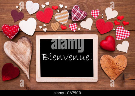 One Chalkbord, Many Red Hearts, Bienvenue Means Welcome Stock Photo