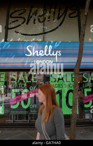 Shoes shoe shop gv general view shellys london sign england hi-res