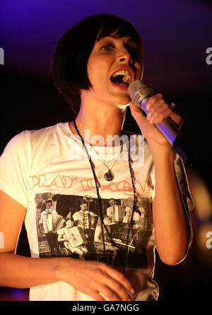 Natalie Imbruglia performs her new single Glorious at an exclusive iTunes gig in the Apple Store, central London. Stock Photo