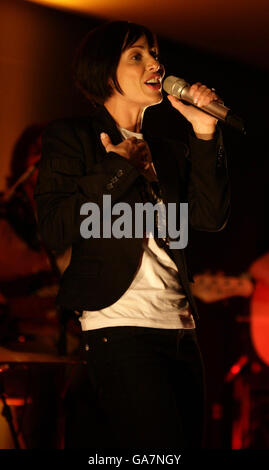 Natalie Imbruglia performs her new single Glorious at an exclusive iTunes gig in the Apple Store, central London. Stock Photo