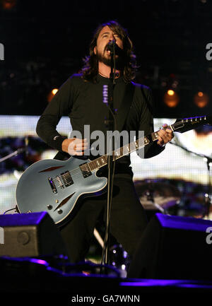 Dave Grohl of the Foo Fighters performing live at the V Festival at Hylands Park in Chelmsford, Essex. Stock Photo