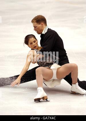 Jamie Sale is caught by partner David Pelletier as she slips on the ice on their way to second position in the pairs short programme Stock Photo