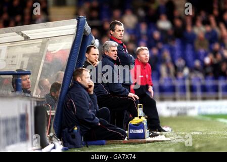 Ipswich Town Manager George Burley looks dejected as he watches his team crash to defeat Stock Photo