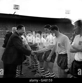 The Lord Mayor of London, Sir Bernard Waley-Cohen shakes hands with the England team as they were presented to him on the field at Wembley before the start of the match which they went on to win 5-1. Stock Photo