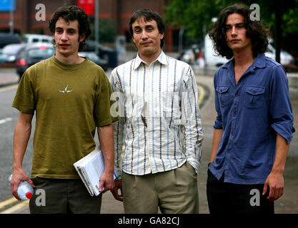 The sons of comedy actor and writer Chris Langham leave Maidstone Crown Court in Kent, during their father's trial (from left to right: Dafydd Jones-Davies, Siencyn Langham and Glyn Langham). Stock Photo