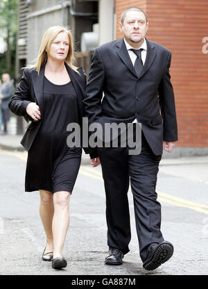 Happy Mondays singer Shaun Ryder & partner arrive for the funeral of music mogul Tony Wilson, at St Mary's RC Church (The Hidden Gem) in central Manchester. Stock Photo