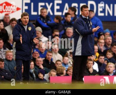 Leeds United's assistant manager Brian Kidd and manager David O'Leary give out instructions to their players during the game against Everton Stock Photo