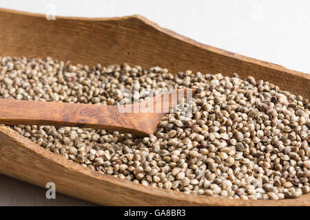 hemp seeds in a wooden bowl Stock Photo
