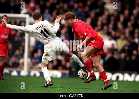 Leeds United's Lee Bowyer (l) challenges Liverpool's John Arne Risse (r) Stock Photo