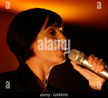 Natalie Imbruglia performs her new single Glorious at an exclusive iTunes gig in the Apple Store, central London. Stock Photo