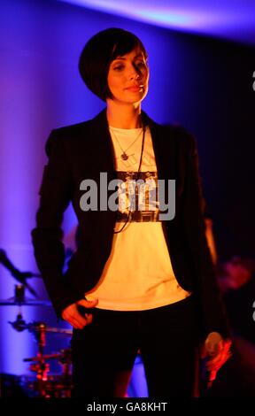 Natalie Imbruglia performs her new single Glorious at an exclusive iTunes gig in the Apple Store, central London. Stock Photo