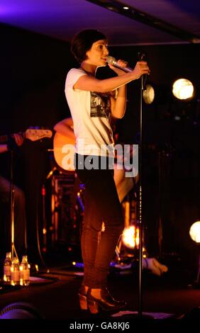 Natalie Imbruglia performs her new single Glorious at an exclusive iTunes gig in the Apple Store, central London. Stock Photo