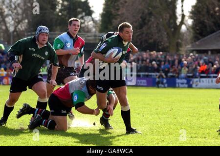 NEC Harlequins Jason Leonard tackles London Irish's Justin Bishop Stock Photo