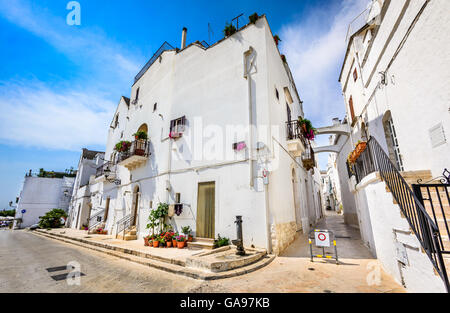 Locorotondo, Italy. Medieval whitewashed street and houses in small city of Puglia, Apulia, Bari region. Stock Photo