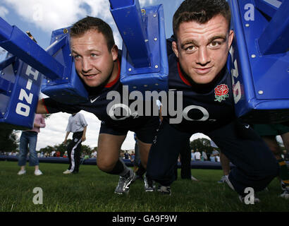 Rugby Union - England O2 Scrum In The Park - Regents Park. England's Mark Regan and Andrew Sheridan practice their scrum during the O2 Scrum In The Park day in Regents Park, London. Stock Photo