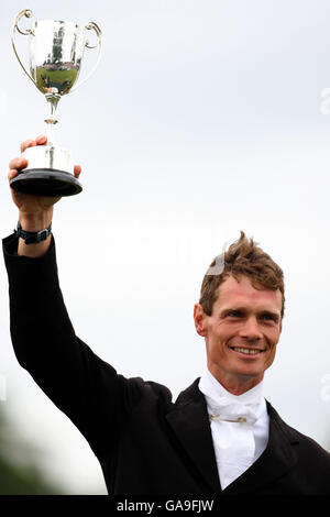 Great Britain's William Fox-Pitt lifts the Land Rover Burghley Horse Trials Trophy, after winning the Three Day Event at Burghley House, Stamford Lincolnshire. Stock Photo