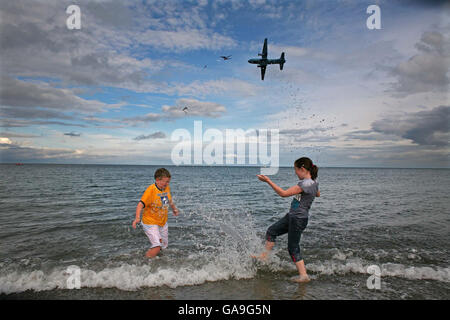 Cillian Donegan age 11 and Ciara Mulhern age 10 , both from Aughrim, Co. Wicklow making a splash at the Bray Air Display which took place at Bray Seafront, County Wicklow in Ireland. Stock Photo