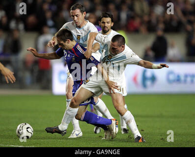 Scotland's Scott Brown (right) and France's Franck Ribery batlle for the ball during the UEFA European Championship Qualifying match at at Park des Princes, Paris. Stock Photo