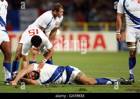 France's Sebastien Chabal lies injured after a high tackle by Namibia's Jacques Nieuwenhius during the IRB World Cup match at the Le Stade, Toulouse, France. Stock Photo