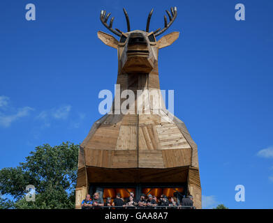 Wacken, Germany. 5th Aug, 2016. A wooden stag on the festival grounds of Wacken Open Air in Wacken, Germany, 5 August 2016. 75,000 fans are attending what organisers say is the largest heavy metal festival in the world. PHOTO: AXEL HEIMKEN/dpa/Alamy Live News Stock Photo