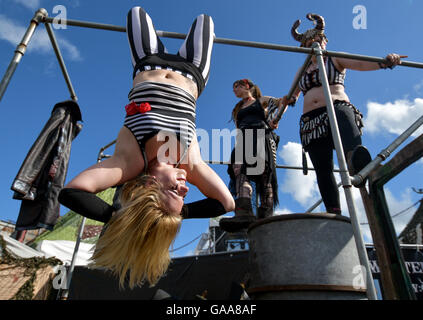 Wacken, Germany. 5th Aug, 2016. Metal fans dancing on the festival grounds of Wacken Open Air in Wacken, Germany, 5 August 2016. 75,000 fans are attending what organisers say is the largest heavy metal festival in the world. PHOTO: AXEL HEIMKEN/dpa/Alamy Live News Stock Photo