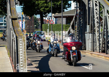 Germany, Cologne, biker on the pivot bridge at the harbor in the district Deutz. Stock Photo