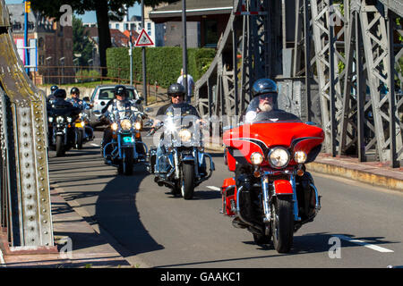 Germany, Cologne, biker on the pivot bridge at the harbor in the district Deutz. Stock Photo