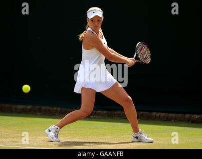 Katie Swan in action against Mariam Bolkvadze during the girls singles on day seven of the Wimbledon Championships at the All England Lawn Tennis and Croquet Club, Wimbledon. Stock Photo