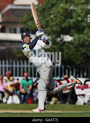 Hampshire captain Shane Warne hits a six during his innings of 46 against Worcestershire during the Liverpool Victoria County Championship Division One match at Chester Road North Ground, Kidderminster. Stock Photo