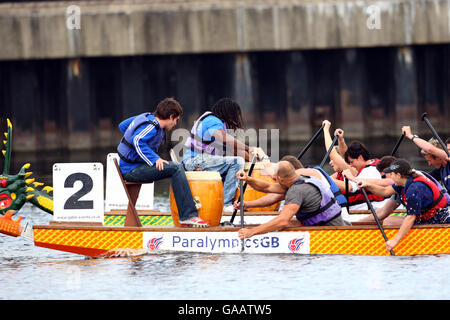 Celebrities and Paralympians take part in a dragon boat race to celebrate one-year-to-go to the Beijing Paralympic Games and to help raise funds for the BPA. Stock Photo