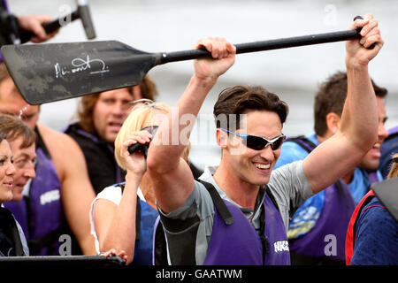 Celebrities and Paralympians take part in a dragon boat race to celebrate one-year-to-go to the Beijing Paralympic Games and to help raise funds for the BPA. Stock Photo