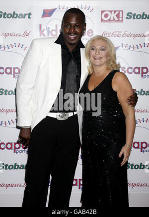 Vanessa Feltz arrives for the Kidscape Charity Fundraiser with her fiance, Ben Ofoedu, at the Grosvenor House Hotel in Park Lane, central London. Stock Photo