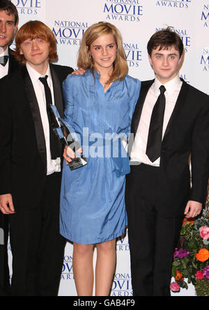 (From left to right) Rupert Grint, Emma Watson and Daniel Radcliffe receive the award for Best Family Film for Harry Potter and the Order of the Phoenix during The National Movie Awards at the Royal Festival Hall, central London. Stock Photo