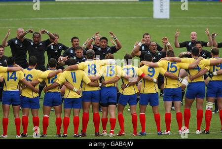 New Zealand perform the Haka in front of Romania's team during the IRB Rugby World Cup Pool C match at Le Stade, Toulouse, France. Stock Photo