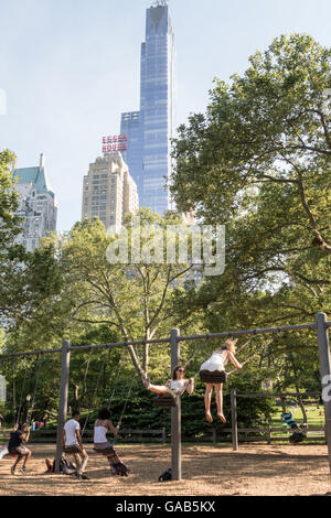 Swings at Heckscher Playground, Central Park, NYC Stock Photo