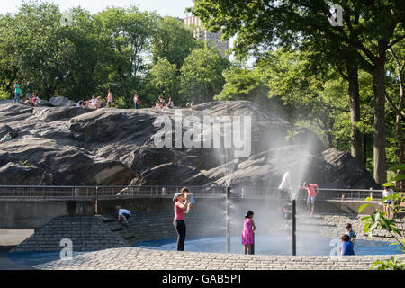 Sprinklers in Heckscher Playground, Central Park, NYC Stock Photo