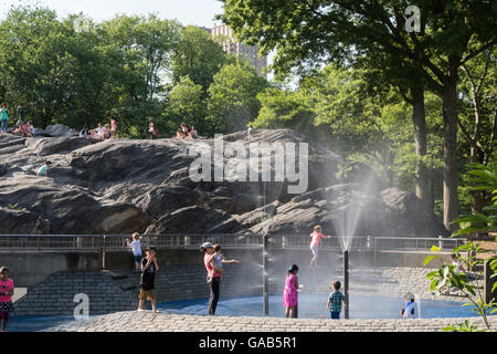 Sprinklers in Heckscher Playground, Central Park, NYC Stock Photo