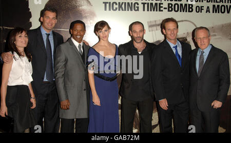 Members of the cast & crew of Kingdom (including Producer Scott Stuber (2nd left), Jamie Foxx (3rd left), Jennifer Garner (centre), Director Peter Berg (2nd right) & Michael Mann (far right)) arrive for the film's UK Premiere, at the Odeon West End in central London. Stock Photo