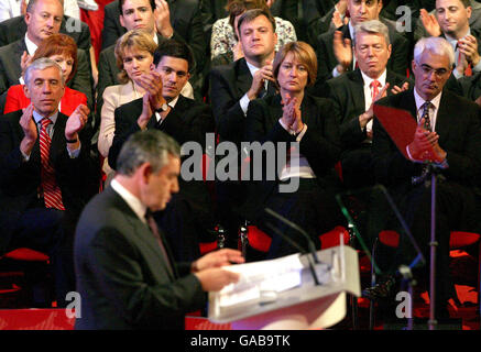 Labour's front bench listens to British Prime Minister Gordon Brown as he delivers his keynote speech to the Labour Party Conference in Bournemouth. Stock Photo