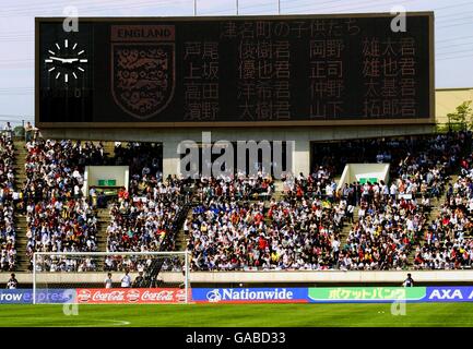 International Soccer - Friendly - England v Cameroon. The England team on the scoreboard in Japanese characters Stock Photo