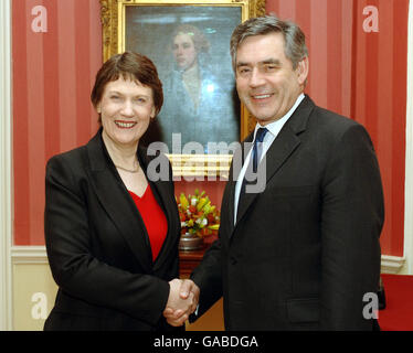 The Prime Minister Gordon Brown shakes hands with Helen Clark, the Prime Minister of New Zealand, when they met at Downing Street this afternoon. Stock Photo