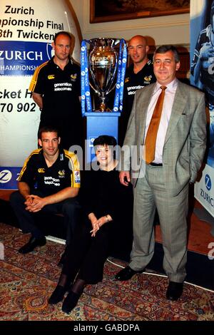 (L-R back to front) Wasps' Alex King, Phil Greening and Joe Worsley with Zurich's Sarah O'Rafferty and James Hill with the Zurich Championship Trophy Stock Photo